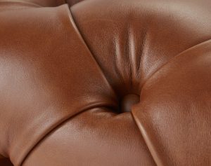 Sophie foot stool button close up